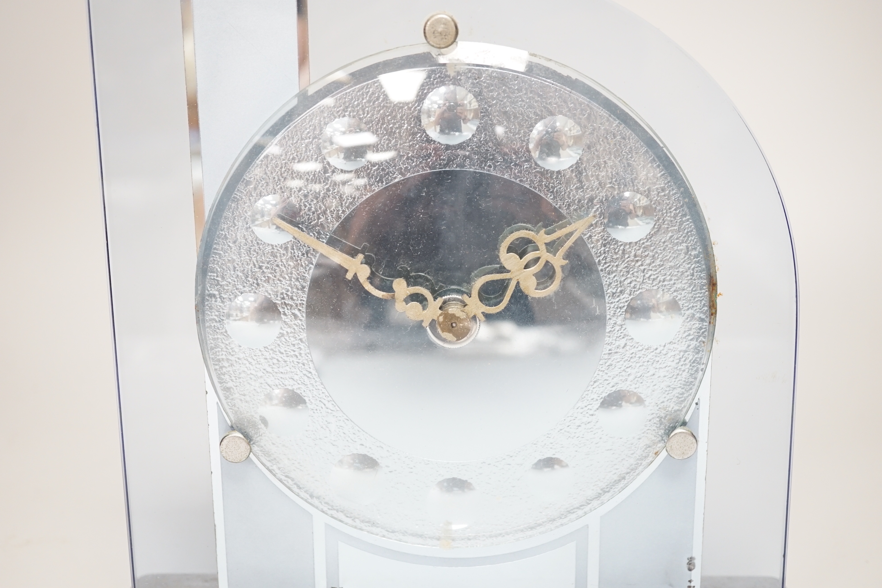 An Art Deco chrome and decorative glass mantel clock, 21cm high